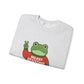 Folded light gray sweatshirt with the Portland protest frog wearing a sweater displaying 'Merry Resistmas' by empowHERbyHeidi