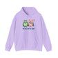 Lilac hoodie with cartoon frog and pig characters holding hands and text 'WE WILL NOT BE QUIET' on a white background by empowHER by Heidi | protest wear