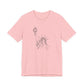 Pink t-shirt with a graphic of the Statue of Liberty by empowHER by Heidi