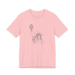 Pink t-shirt with a graphic of the Statue of Liberty by empowHER by Heidi