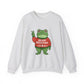 Ash sweatshirt with the Portland protest frog wearing a sweater displaying 'Merry Resistmas' by empowHERbyHeidi