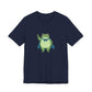 Navy t-shirt with a bold graphic of the Portland protest frog—red eyes, blue cape, and unimpressed face by empowHERbyHeidi