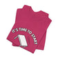 Folded pink t-shirt with a flipping table graphic and text "It's time to start" by empowHER by Heidi