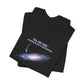 Folded black t-shirt with graphic of the Milky Way galaxy with an arrow pointing to it and text that says "YOU ARE HERE - Paying taxes to pedophiles" by empowHER by Heidi