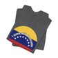 Folded gray t-shirt with a circular design featuring the Venezuelan flag and 'I stand with Venezuela' text by empowHER by Heidi