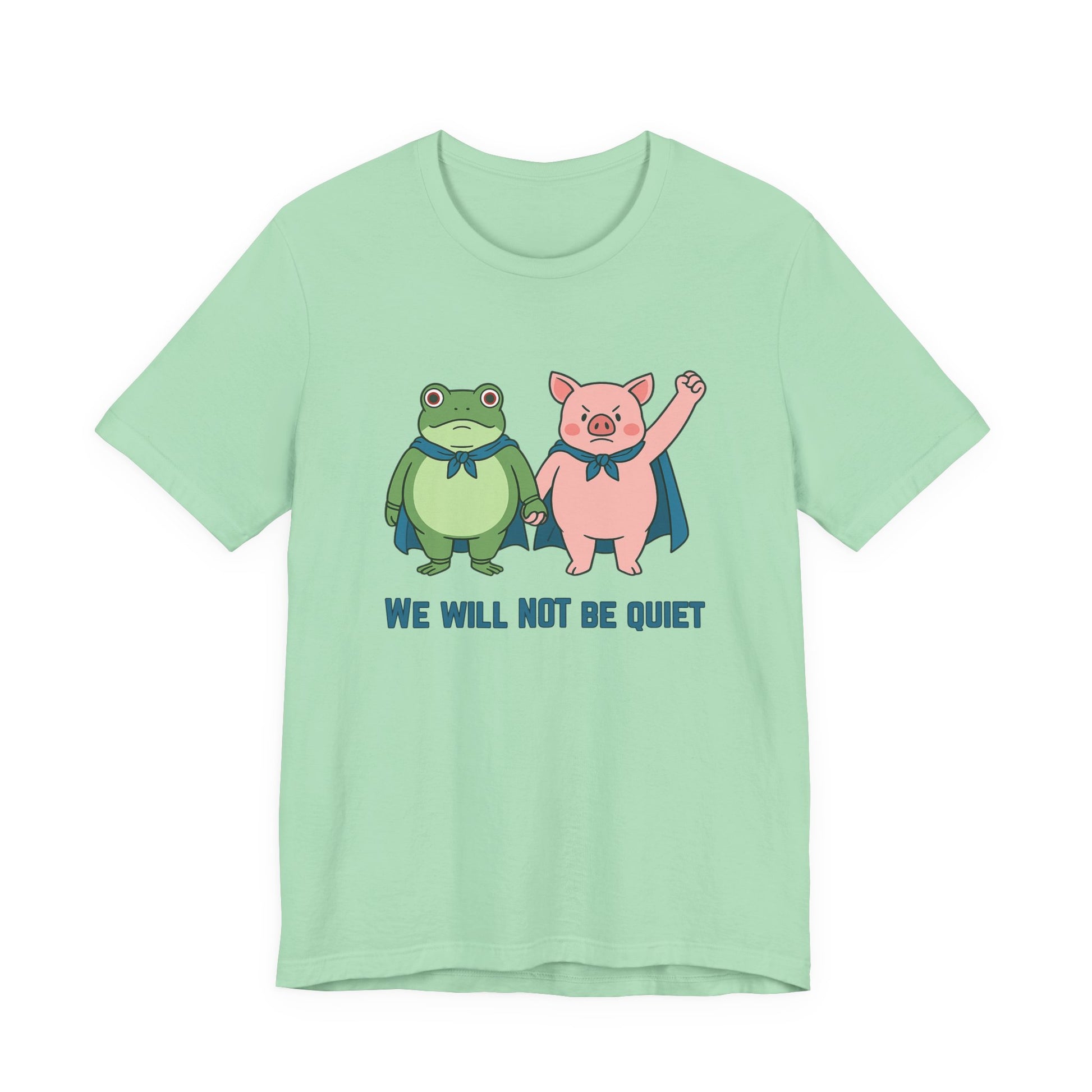 Mint green t-shirt with cartoon frog and pig characters holding hands and text 'WE WILL NOT BE QUIET' on a white background by empowHER by Heidi | protest wear