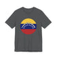 Gray t-shirt with a circular design featuring the Venezuelan flag and 'I stand with Venezuela' text by empowHER by Heidi