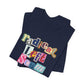 Folded navy t-shirt with colorful text "radical left scum" design by empowHER by Heidi