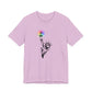 Lilac t-shirt with the Statue of Liberty and rainbow Pride colors emitting from her torch by empowHER by Heidi