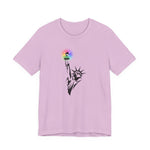 Lilac t-shirt with the Statue of Liberty and rainbow Pride colors emitting from her torch by empowHER by Heidi