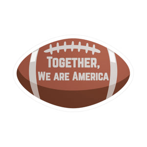 Football-shaped sticker with 'Together, We Are America' text from the Super Bowl Half-time show with Bad Bunny
