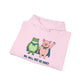 Light pink hoodie with cartoon frog and pig characters holding hands and text 'WE WILL NOT BE QUIET' on a white background by empowHER by Heidi | protest wear