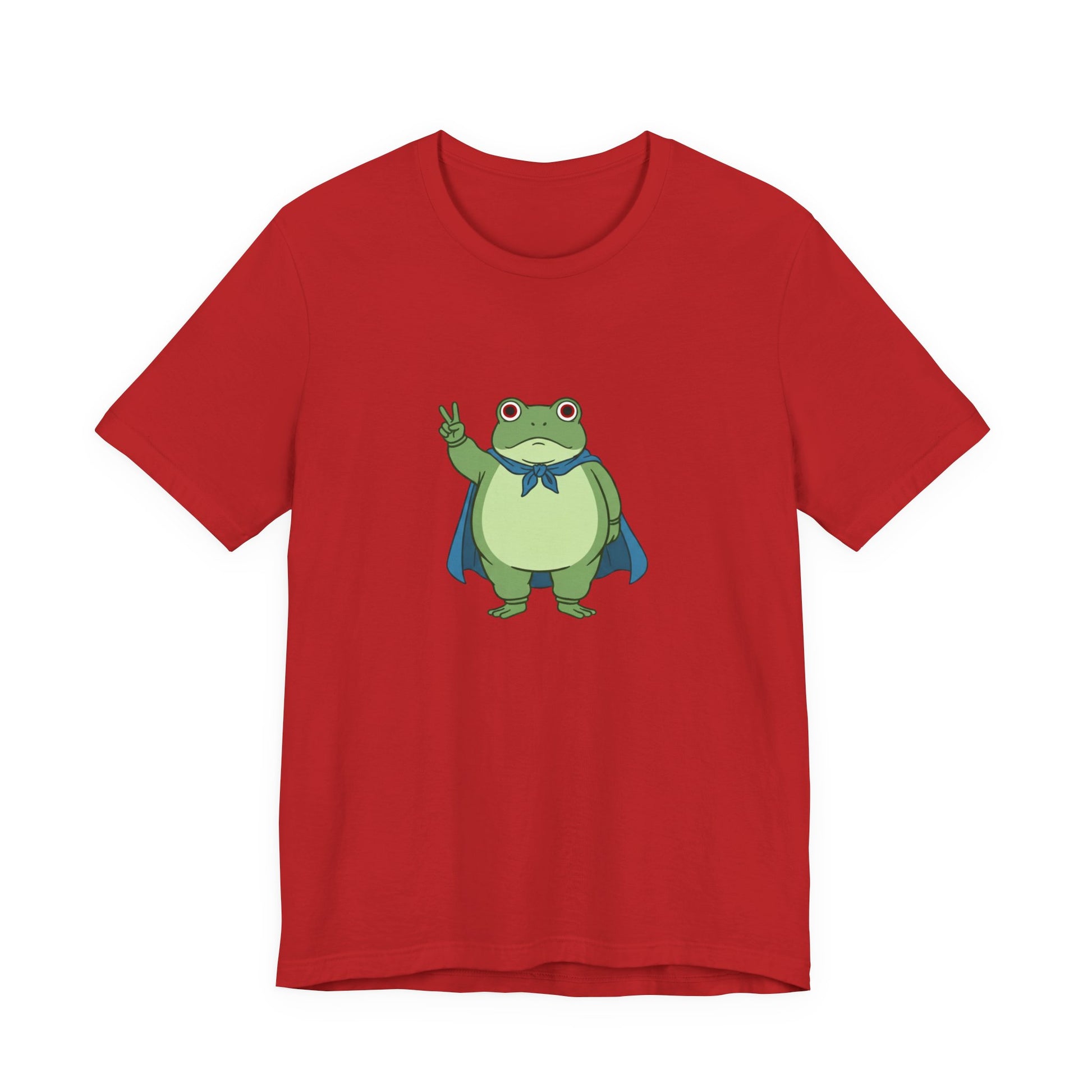 Red t-shirt with a bold graphic of the Portland protest frog—red eyes, blue cape, and unimpressed face by empowHERbyHeidi
