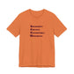 Orange t-shirt with blue text 'Solidarity Creates Unstoppable Movements' by empowHER by Heidi