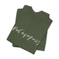 Folded military green t-shirt with the mathematical equation "8+6+4+7=25" written in chalk like text by empowHER by Heidi