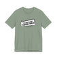 Sage green t-shirt with cartoon speech bubble with text "It's Time to Start Flipping Tables" by empowHER by Heidi