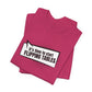 Folded pink t-shirt with cartoon speech bubble with text "It's Time to Start Flipping Tables" by empowHER by Heidi