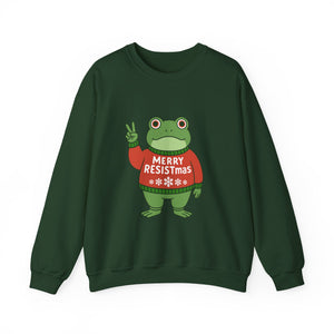 Green sweatshirt with the Portland protest frog wearing a sweater displaying 'Merry Resistmas' by empowHERbyHeidi