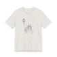 White t-shirt with a graphic of the Statue of Liberty by empowHER by Heidi