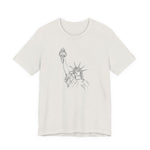White t-shirt with a graphic of the Statue of Liberty by empowHER by Heidi