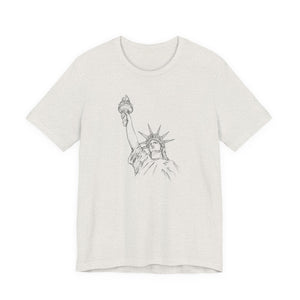 White t-shirt with a graphic of the Statue of Liberty by empowHER by Heidi