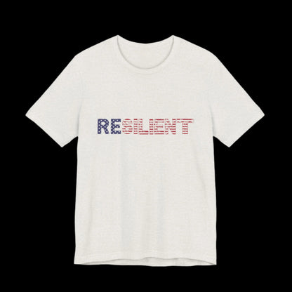 White t-shirt with 'RESILIENT' text in red, white, and blue American Flag letters on a black background