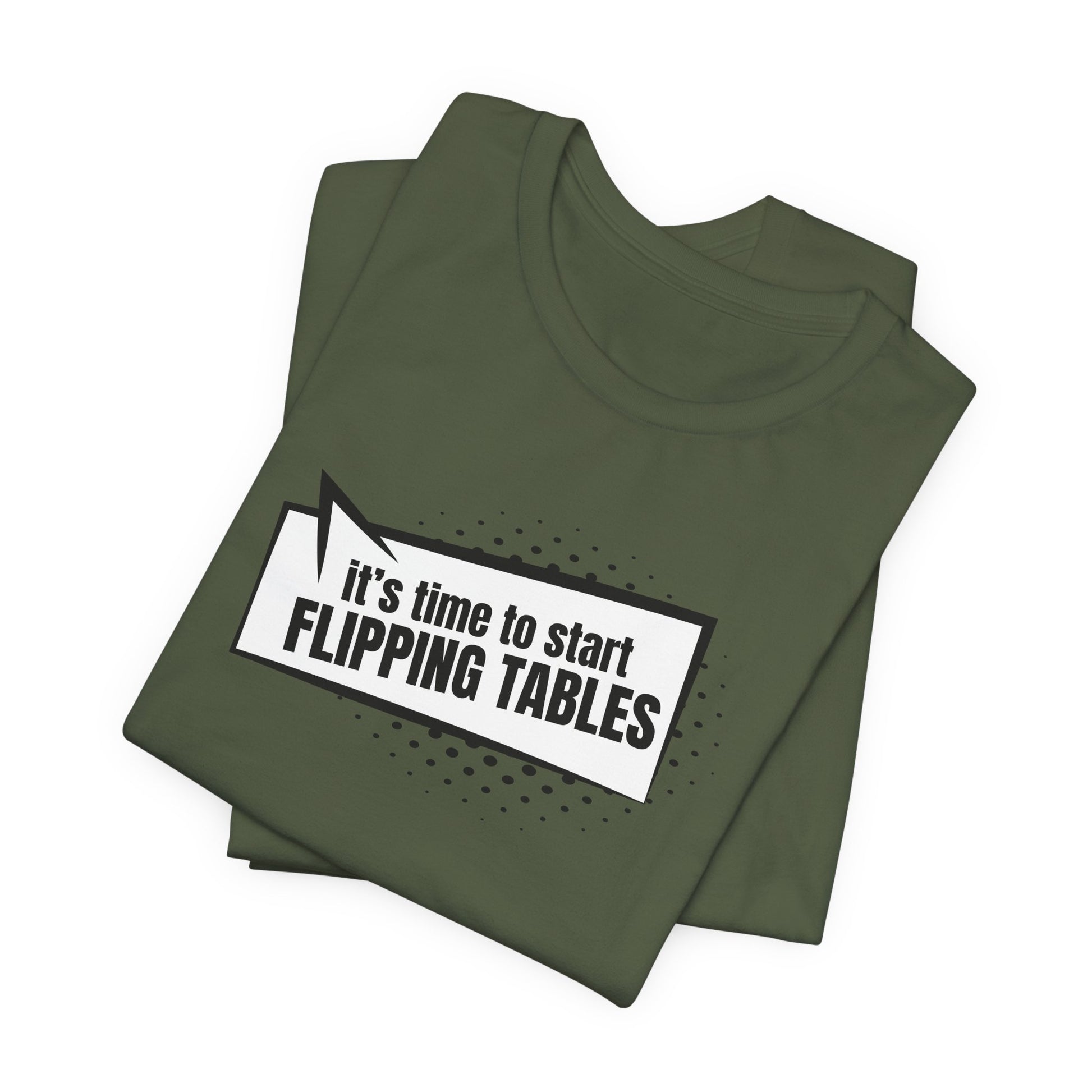 Folded military green t-shirt with cartoon speech bubble with text "It's Time to Start Flipping Tables" by empowHER by Heidi