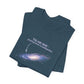 Folded dark blue t-shirt with graphic of the Milky Way galaxy with an arrow pointing to it and text that says "YOU ARE HERE - Paying taxes to pedophiles" by empowHER by Heidi
