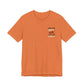Orange t-shirt with a graphic and text "raise your voice, not your fist" – empowHER by Heidi political protest apparel