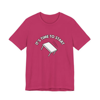 Pink t-shirt with a flipping table graphic and text "It's time to start" by empowHER by Heidi