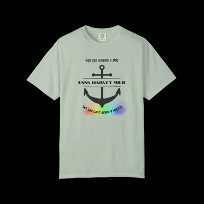 Light green t-shirt with a graphic design of a naval anchor with the text "You can rename a ship {USNS Harvey Milk} but you can't erase a legacy"