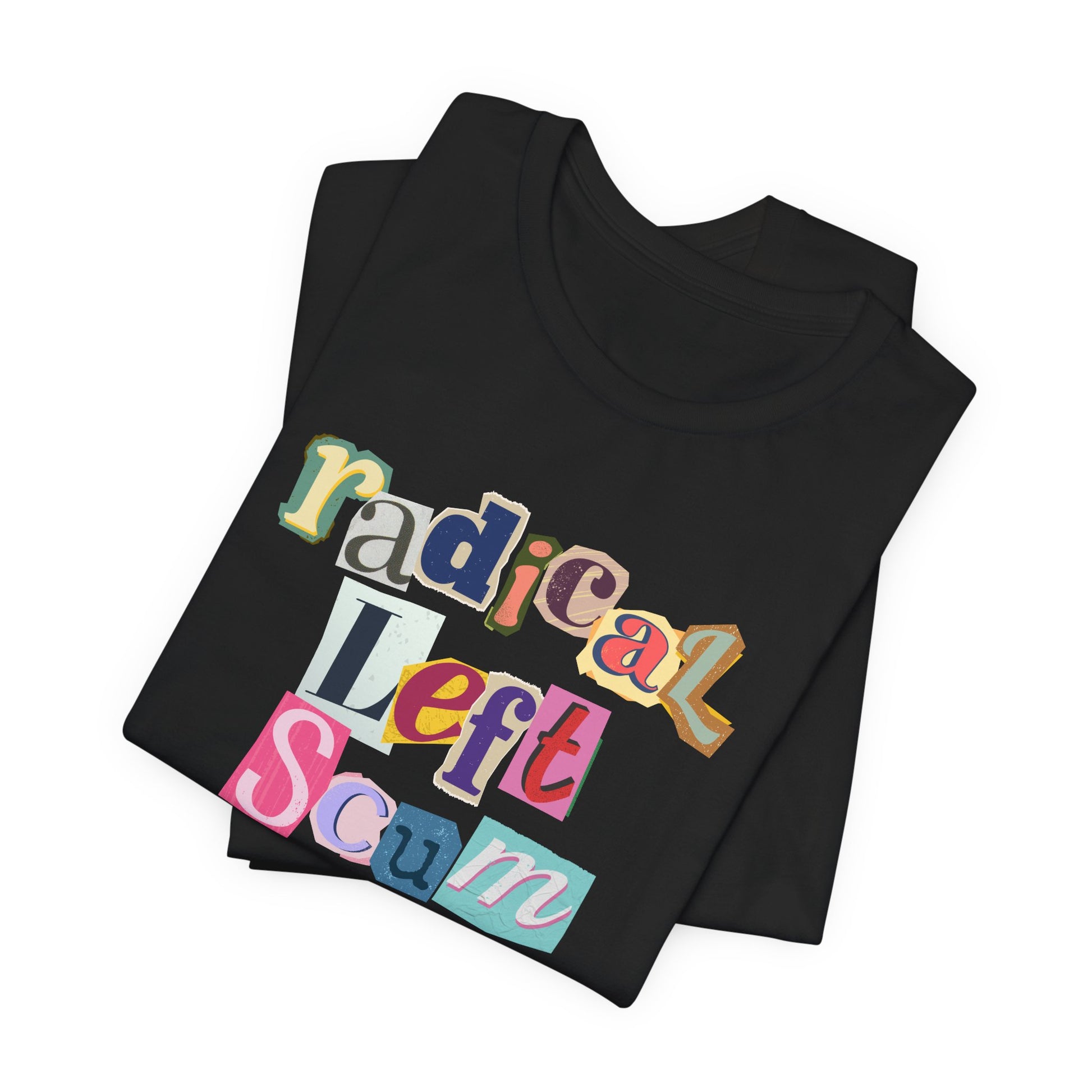 Folded black t-shirt with colorful text "radical left scum" design by empowHER by Heidi
