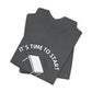 Folded gray t-shirt with a flipping table graphic and text "It's time to start" by empowHER by Heidi