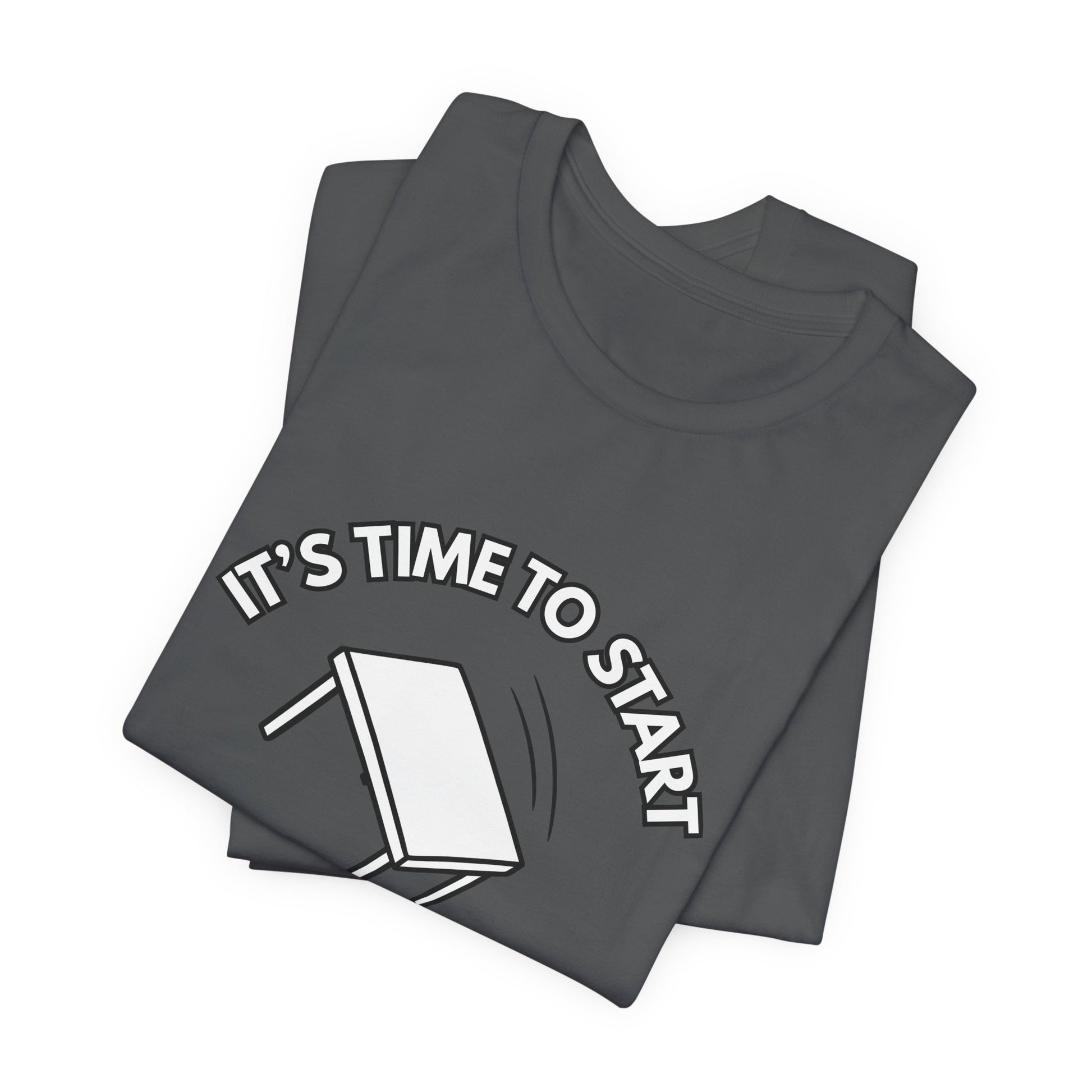 Folded gray t-shirt with a flipping table graphic and text "It's time to start" by empowHER by Heidi