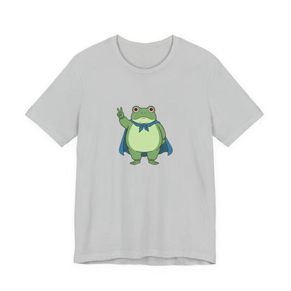 Gray t-shirt with a bold graphic of the Portland protest frog—red eyes, blue cape, and unimpressed face by empowHERbyHeidi
