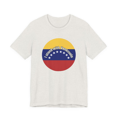 White t-shirt with a circular design featuring the Venezuelan flag and 'I stand with Venezuela' text by empowHER by Heidi