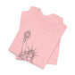 Folded pink t-shirt with Statue of Liberty design by empowHER by Heidi