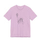 Lilac t-shirt with a graphic of the Statue of Liberty by empowHER by Heidi