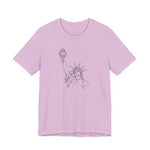 Lilac t-shirt with a graphic of the Statue of Liberty by empowHER by Heidi