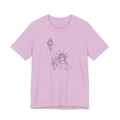 Lilac t-shirt with a graphic of the Statue of Liberty by empowHER by Heidi