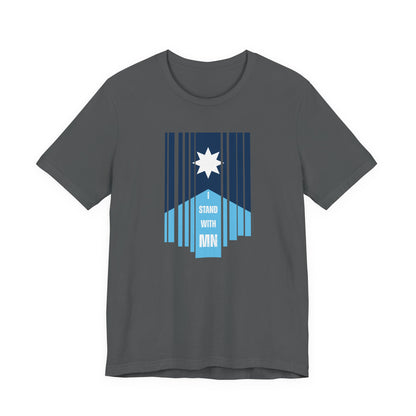 Gray t-shirt with a stylized Minnesota flag and text "I Stand with MN" by empowHER by Heidi