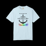 Light blue t-shirt with a graphic design of a naval anchor with the text "You can rename a ship {USNS Harvey Milk} but you can't erase a legacy"