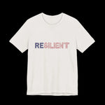 White t-shirt with 'RESILIENT' text in red, white and blue American Flag on a plain background