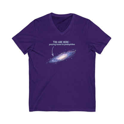 Purple v-neck t-shirt with graphic of the Milky Way galaxy with an arrow pointing to it and text that says "YOU ARE HERE - Paying taxes to pedophiles" by empowHER by Heidi