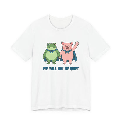 White t-shirt with cartoon frog and pig characters holding hands and text 'WE WILL NOT BE QUIET' on a white background by empowHER by Heidi | protest wear