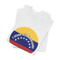 Folded ash gray t-shirt with a circular design featuring the Venezuelan flag and 'I stand with Venezuela' text by empowHER by Heidi