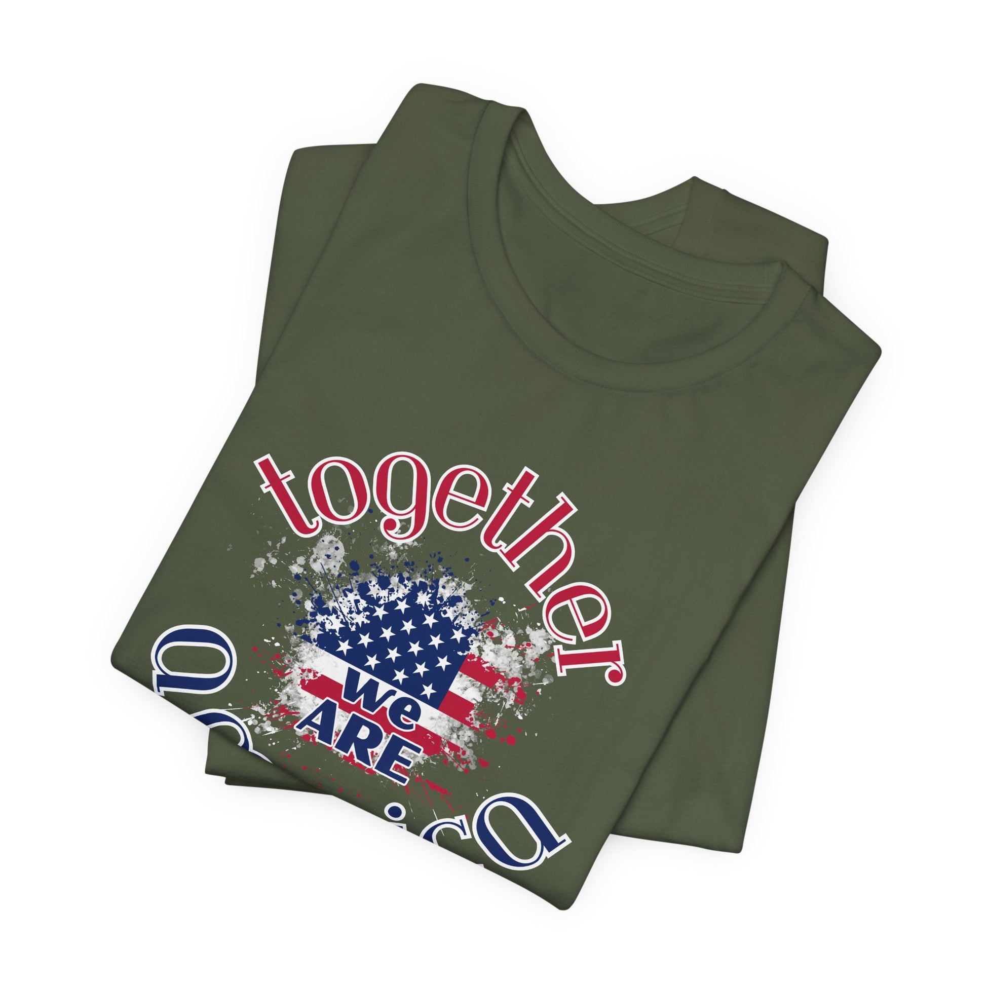 Folded green t-shirt with 'Together We Are America' graphic design on a white background