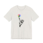 Heather cement t-shirt with the Statue of Liberty and rainbow Pride colors emitting from her torch by empowHER by Heidi