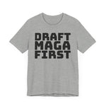 Gray t-shirt with 'Draft MAGA First' text on a plain background