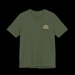 Green t-shirt with small text on left chest that says "Stop Protecting Predators"